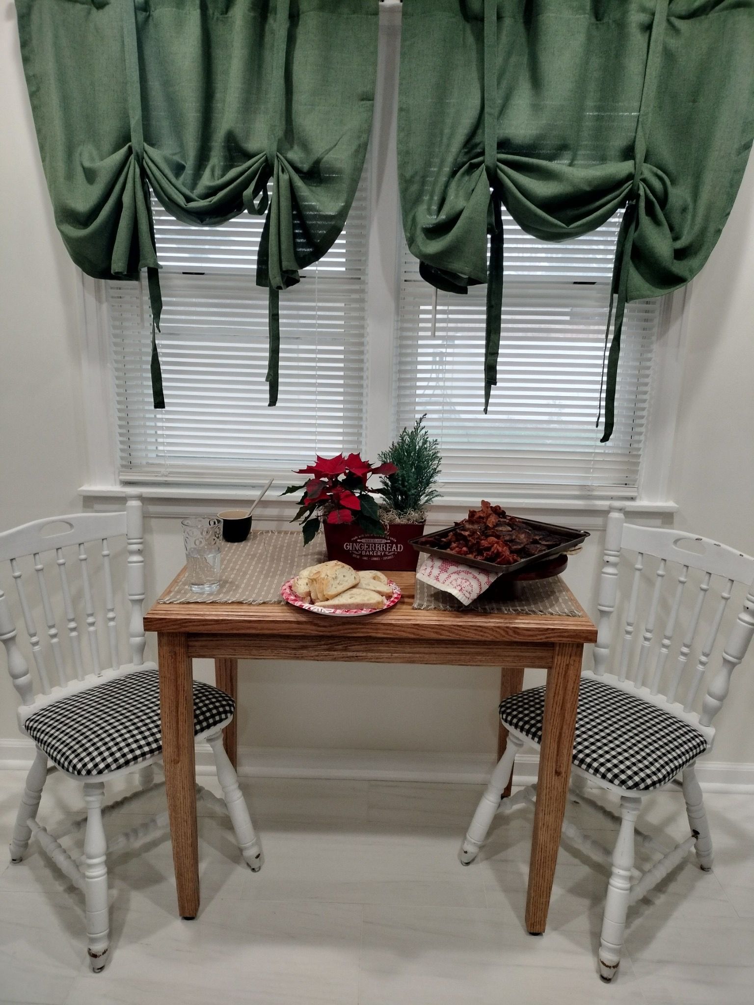 Small handmade oak table styled in a cozy breakfast nook
