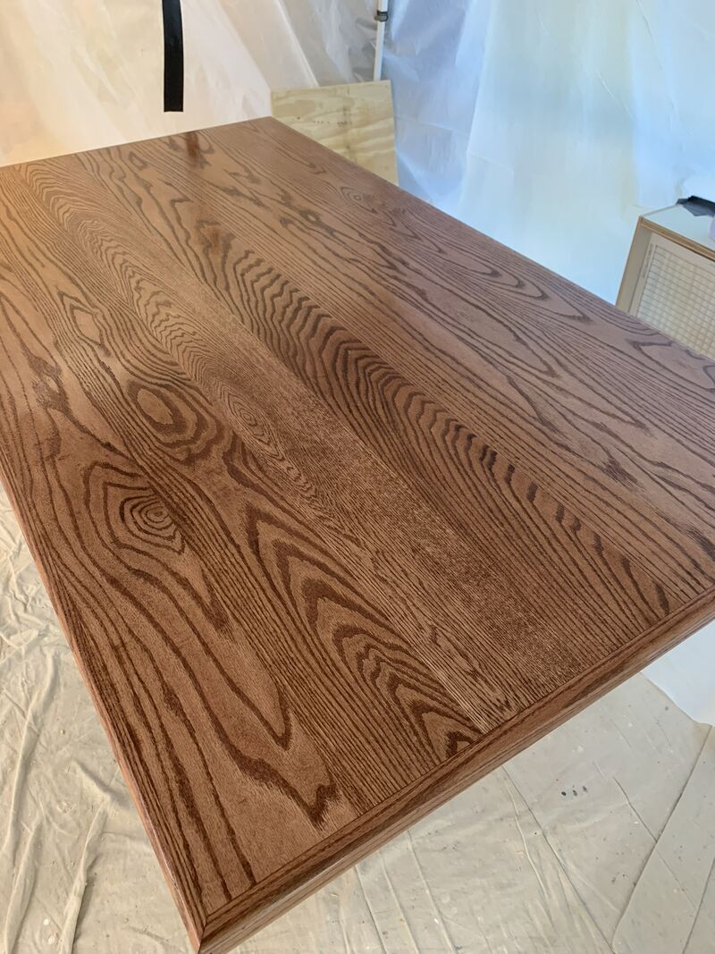 Close-up of oak tabletop grain and finish